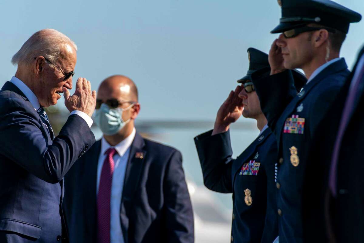 President Joe Biden boards Air Force One at Andrews Air Force Base, Md., Wednesday, May 19, 2021. Biden is traveling to attend the commencement for the United States Coast Guard Academy in New London, Conn. (AP Photo/Andrew Harnik)