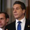 Gov. Andrew Cuomo says that half of New Yorkers have received at least one dose of COVID-19 vaccination but those who work in institutions such as prisons and residential centers for the disabled are lagging. 