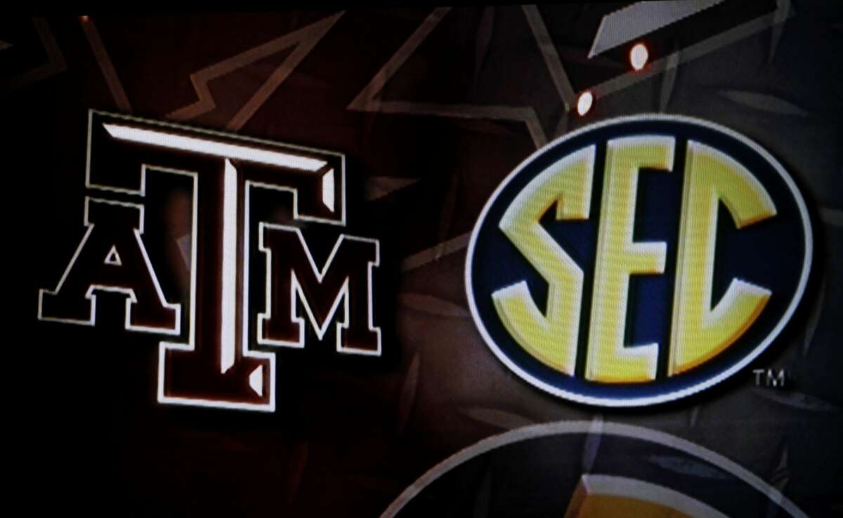 COLLEGE STATION, TX - SEPTEMBER 26: The Southeastern Conference logo and the Texas A&M Aggies logo is seen on a screen during a press conference for Texas A&M accepting an invitation to join the Southeastern Conference on September 26, 2011 in College Station, Texas. (Photo by Aaron M. Sprecher/Getty Images)