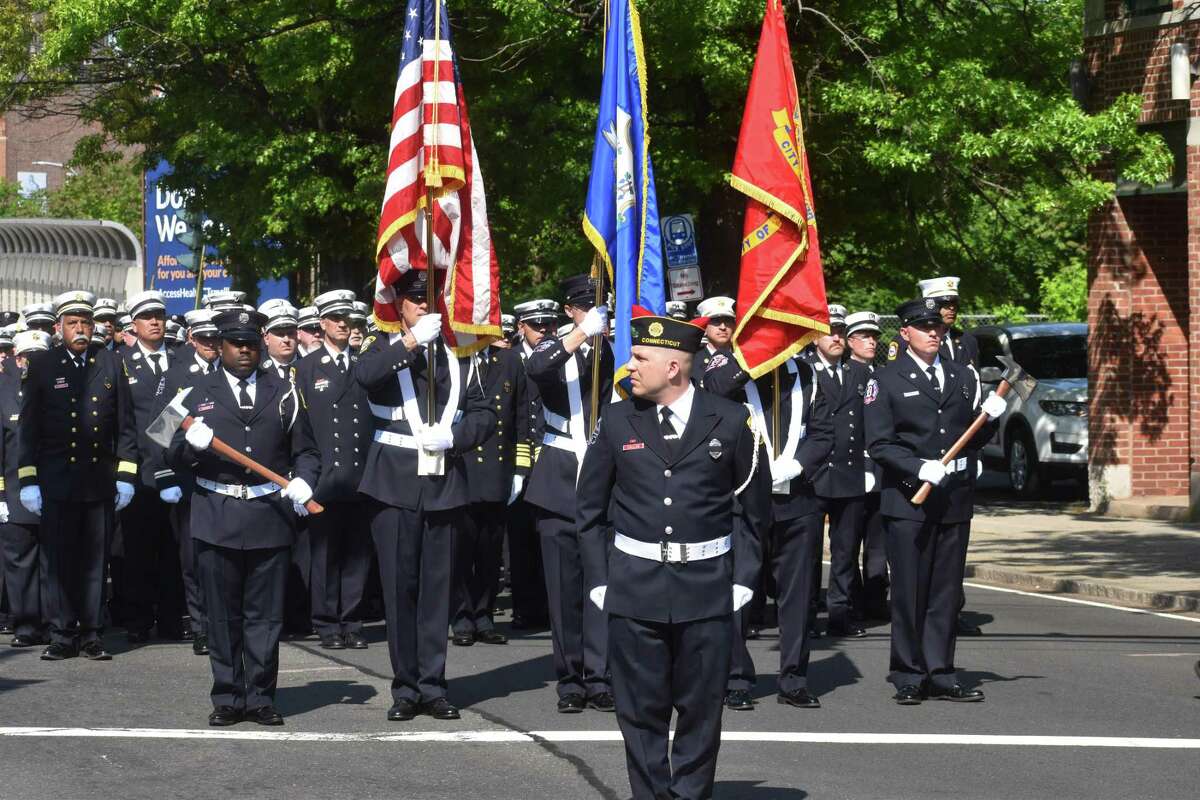 New Haven firefighters gathered ahead of the funeral for Firefighter Ricardo Torres Jr., who died last Wednesday while battling a fire on Valley Street.
