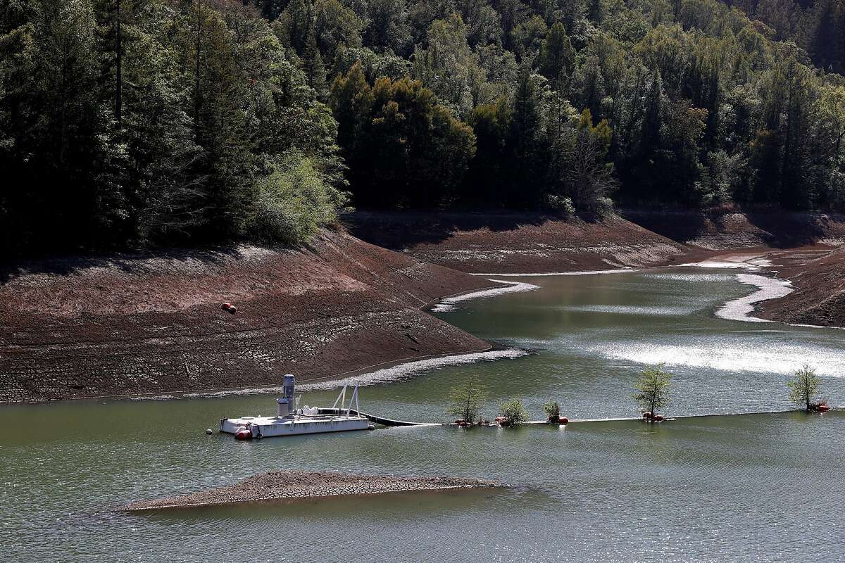 ROSS, CALIFORNIA - APRIL 21: Low water levels are visible at Phoenix Lake on April 21, 2021 in Ross, California. Marin County became the first county in California to impose mandatory water-use restrictions that are set to take effect May 1. Residents will be ordered to refrain from washing cars at home, refilling pools and only water lawns once a week. California Gov. Gavin Newsom declared a drought emergency in Sonoma and Mendocino counties as the worsening drought takes hold in the state. (Photo by Justin Sullivan/Getty Images)