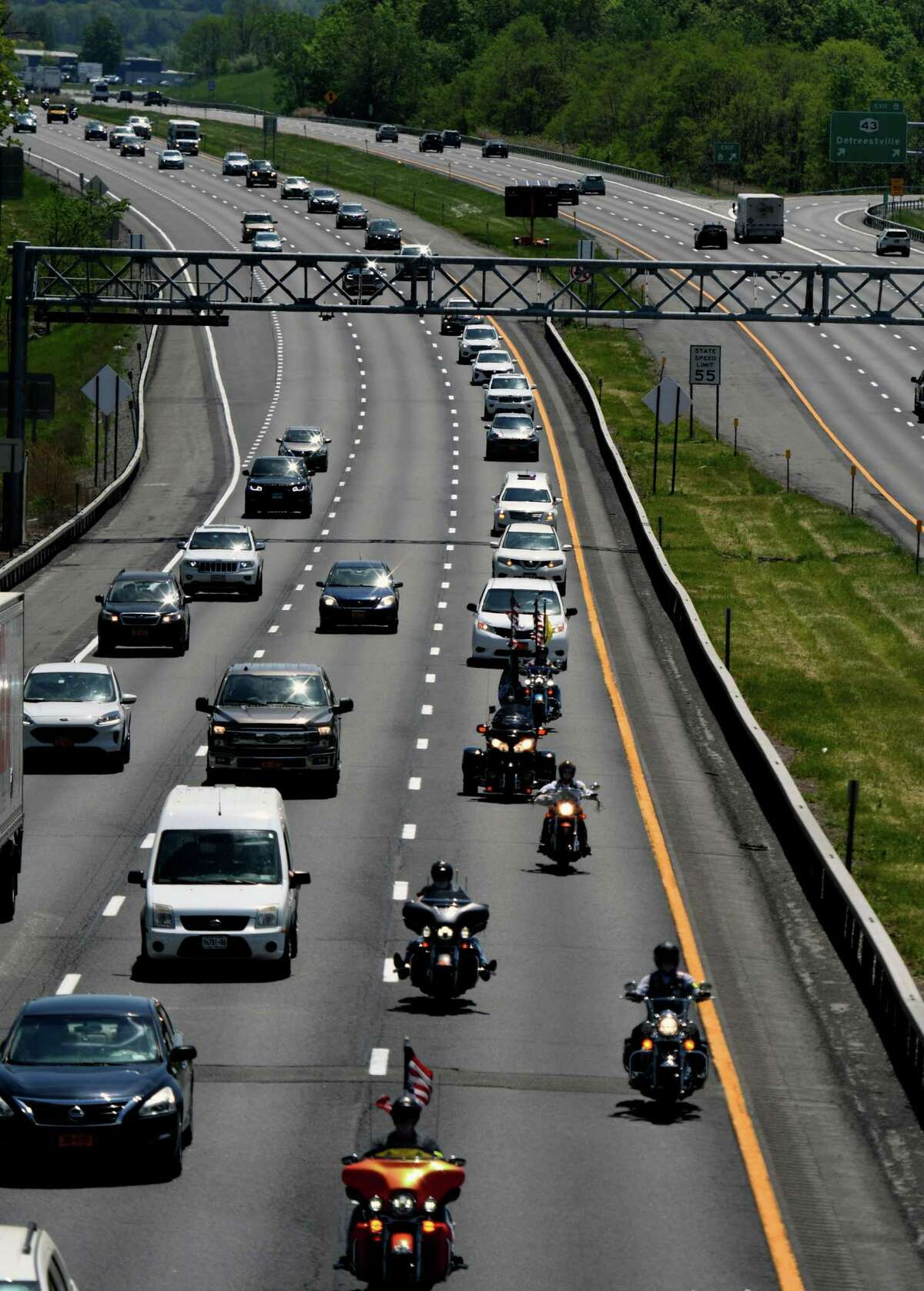 A funeral procession for Korean War veteran Army Cpl. Clifford S. Johnson of Valatie heads West on I-90 below Washington Avenue on Thursday, May 20, 2021, in Rensselaer, N.Y. Johnson was a member of Headquarters Battery, 57th Field Artillery Battalion, 7th Infantry Division. He was reported missing in action Dec. 6, 1950, when his unit was attacked by enemy forces near the Chosin Reservoir, North Korea. Following the battle, his remains could not be recovered. He was just 20 years old. He was accounted for by the Defense POW/MIA Accounting Agency on April 16, 2020, after his remains were identified using circumstantial and material evidence and mitochondrial and autosomal DNA analysis.(Will Waldron/Times Union)