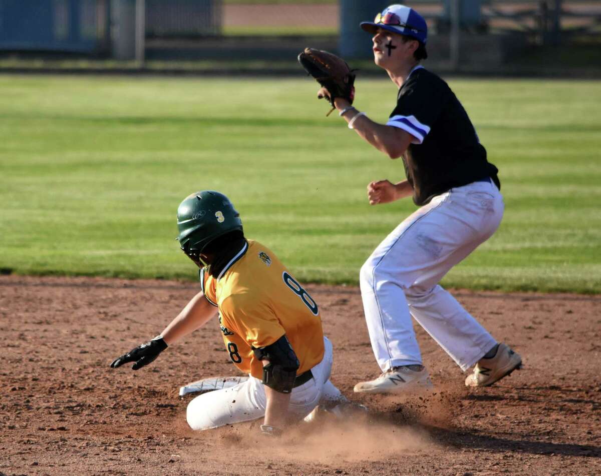 Hamden's Max Gross steals second base during a baseball game at Piurek Field, West Haven on Thursday, May 20, 2021.