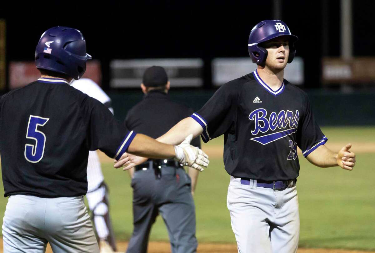 Montgomery first baseman Chase Davis, right, was named to the District 20-5A First Team.