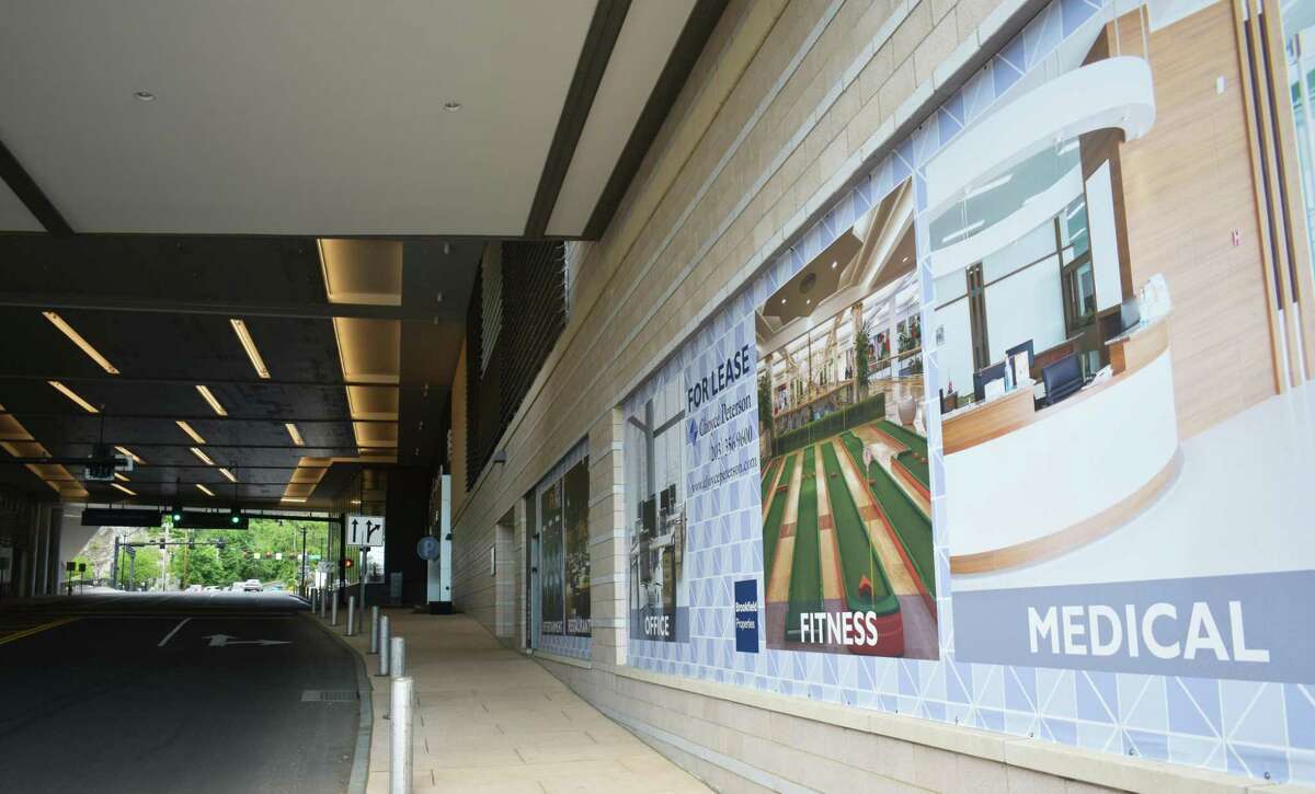 A signs outside the SoNo Collection advertise plans for mixed-use space that is planned to be developed adjacent to the Norwalk mall. Increasingly, mall owners, including at least a half dozen in Connecticut, are turning to mixed-use projects to help increase foot traffic in their retail centers.