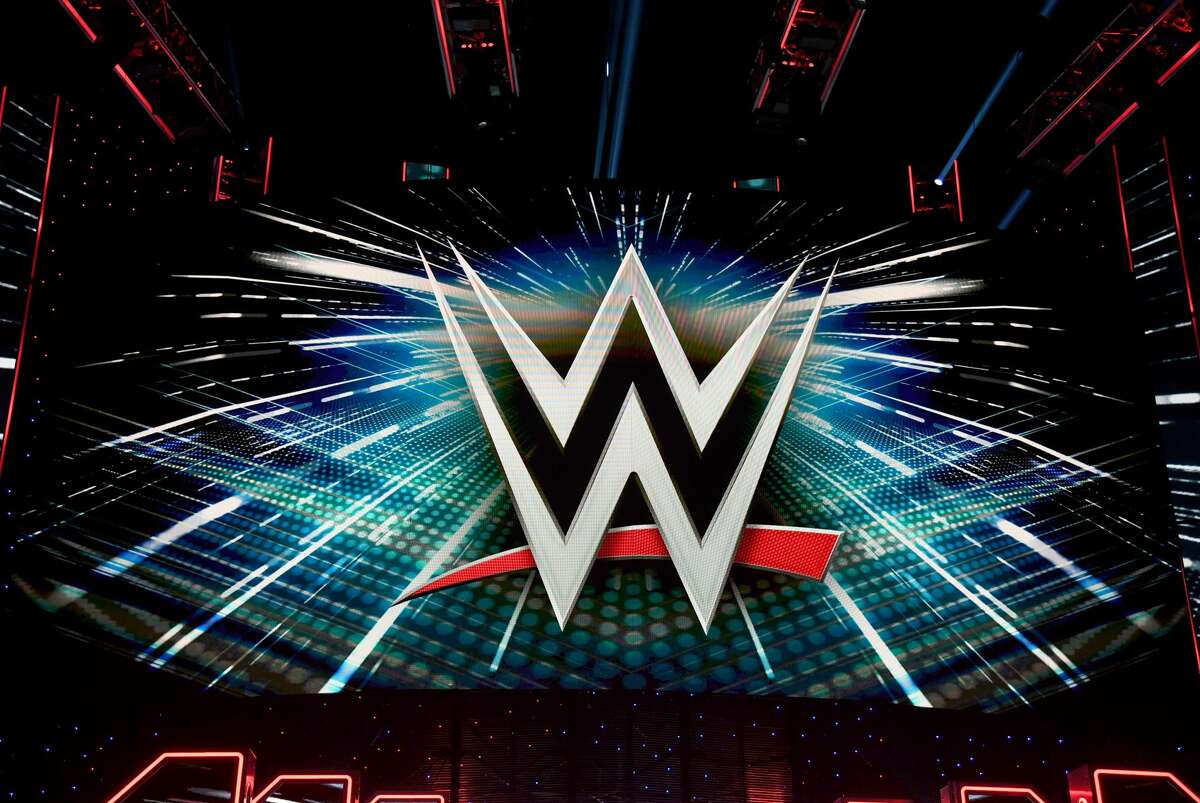 A WWE logo is shown on a screen before a WWE news conference at T-Mobile Arena on October 11, 2019 in Las Vegas, Nevada.
