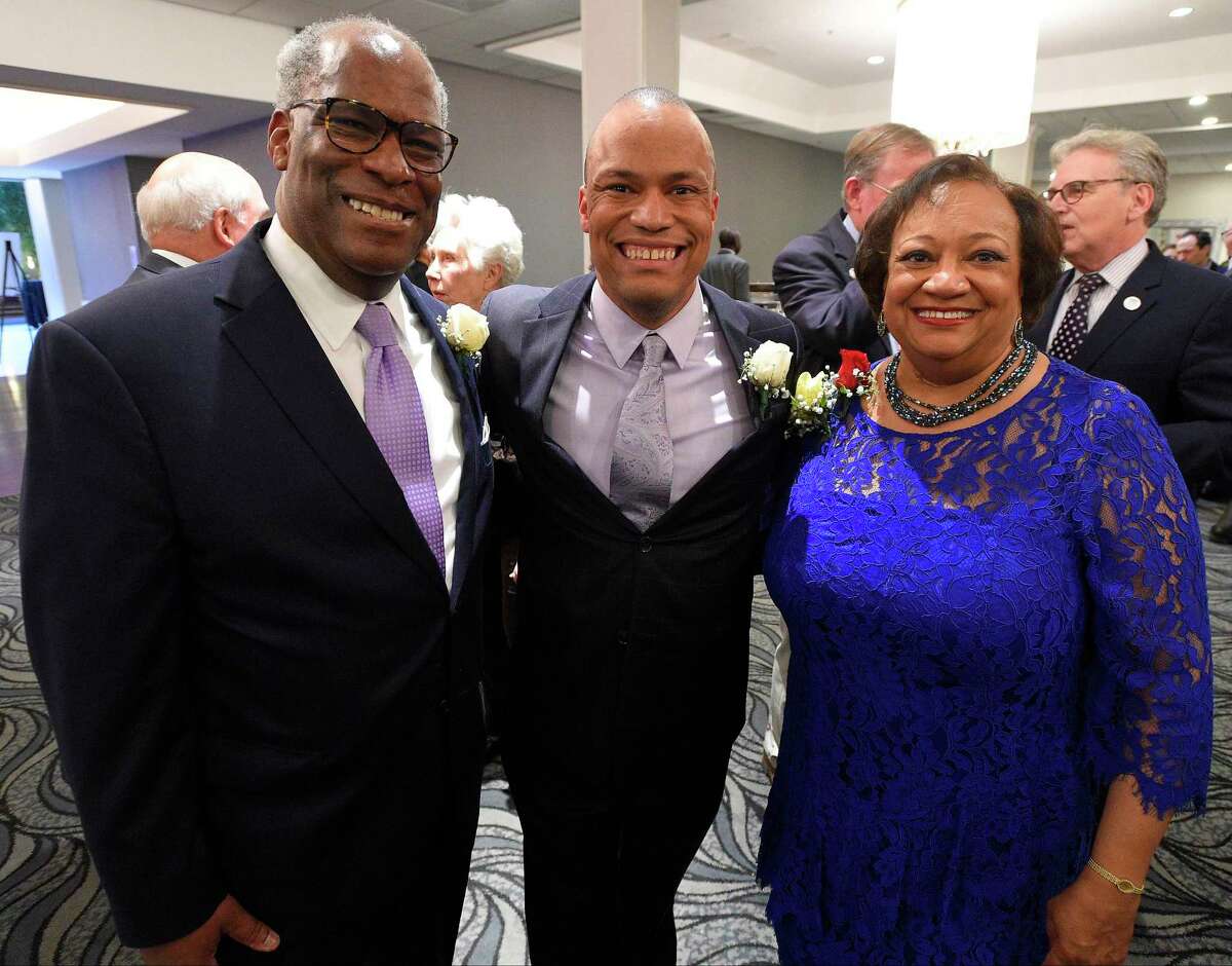 From left, Dudley Williams Jr., his son Dudley Williams III, and wife Juanita T. James, pose for a family photo prior to the Stamford's 73rd Annual Citizen of the Year dinner at the Crowne Plaza Stamford on April. 24, 2017 in Stamford, Connecticut. Along with Williams being honored as COTY, several young scholars and Veterans were recognized, with each student recipient receiving a $7,500 scholarship. The event is sponsored by the city and the Jewish War Veterans.