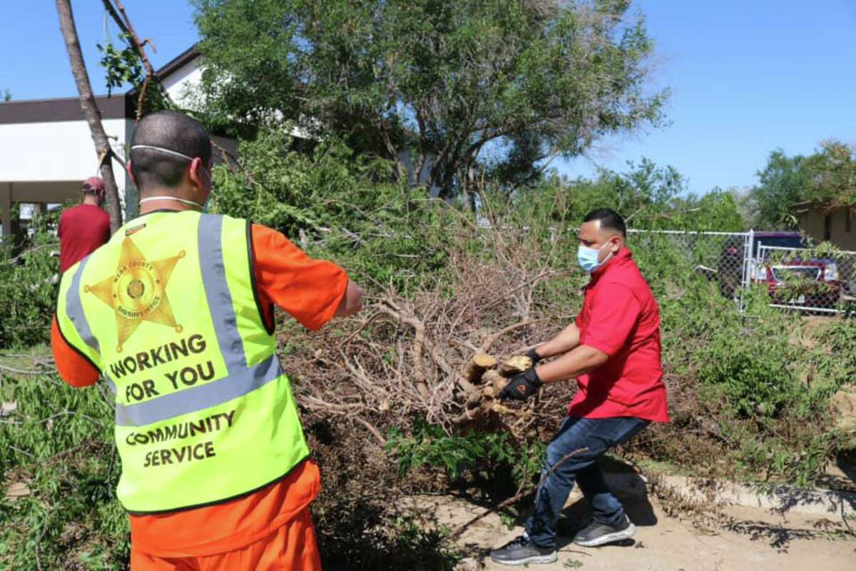 Webb County Jail inmates assisted Rio Bravo officials cleaning up the city after the storm. Low-risk inmates participated in this effort as part of the Alternative Incarceration Program.