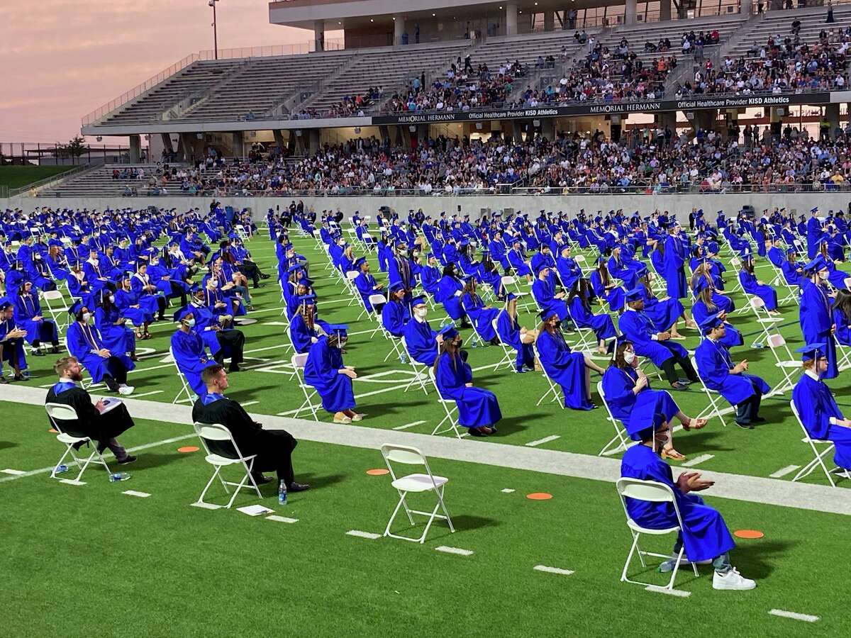 The James E. Taylor High School Class of 2021 sits during its graduation ceremony at Legacy Stadium in Katy on Thursday, May 20.