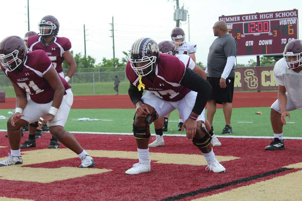 Summer Creek offensive lineman Kelvin Banks Jr. warmimg up for the Bulldogs' spring game on the Summer Creek practice field.