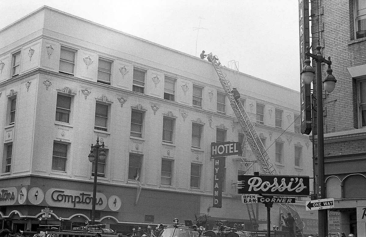 Firefighters respond to a fire at the Hyland Hotel in this photograph from 1970. To the left is Compton’s Cafeteria, the site of a historic queer riot in 1966. There are few known images that show the exterior of the diner, signage included.