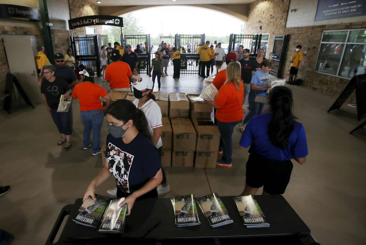 Fans enter the ballpark before a minor league baseball game between the Sugar Land Skeeters and the El Paso Chihuahuas on Friday, May 21, 2021, at Constellation Field in Sugar Land.