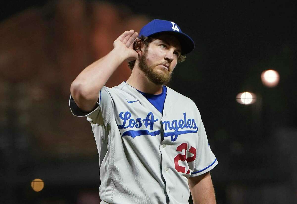 SAN FRANCISCO, CALIFORNIA - MAY 21: Trevor Bauer #27 of the Los Angeles Dodgers reacts to fans booing him as he leaves the game against the San Francisco Giants in the seventh inning at Oracle Park on May 21, 2021 in San Francisco, California. (Photo by Thearon W. Henderson/Getty Images)