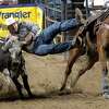 Riders compete in the 75th annual PRCA rodeo on its opening night at the YMBL South Texas State Fair Friday. Photo made Friday, May 21, 2021 Kim Brent/The Enterprise