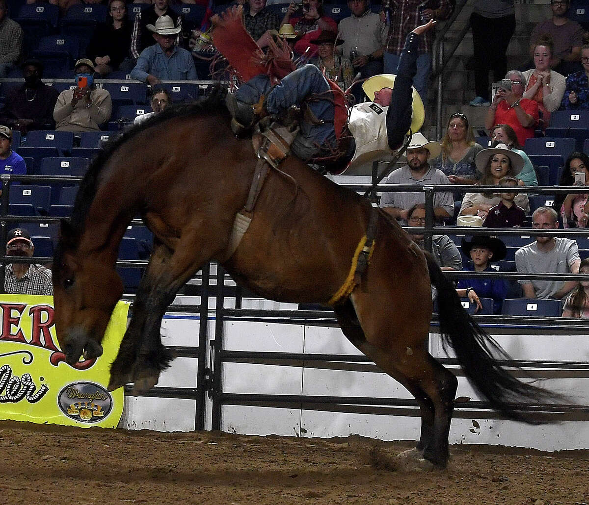 Riders compete in the 75th annual PRCA rodeo on its opening night at the YMBL South Texas State Fair Friday. Photo made Friday, May 21, 2021 Kim Brent/The Enterprise