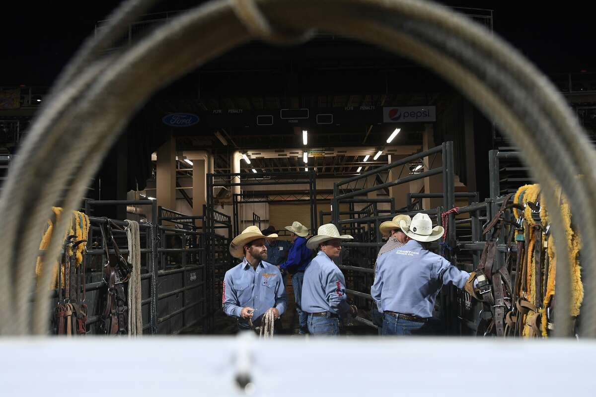 Riders and rodeo staff get ready for the 75th annual PRCA rodeo on its opening night at the YMBL South Texas State Fair Friday. Photo made Friday, May 21, 2021 Kim Brent/The Enterprise