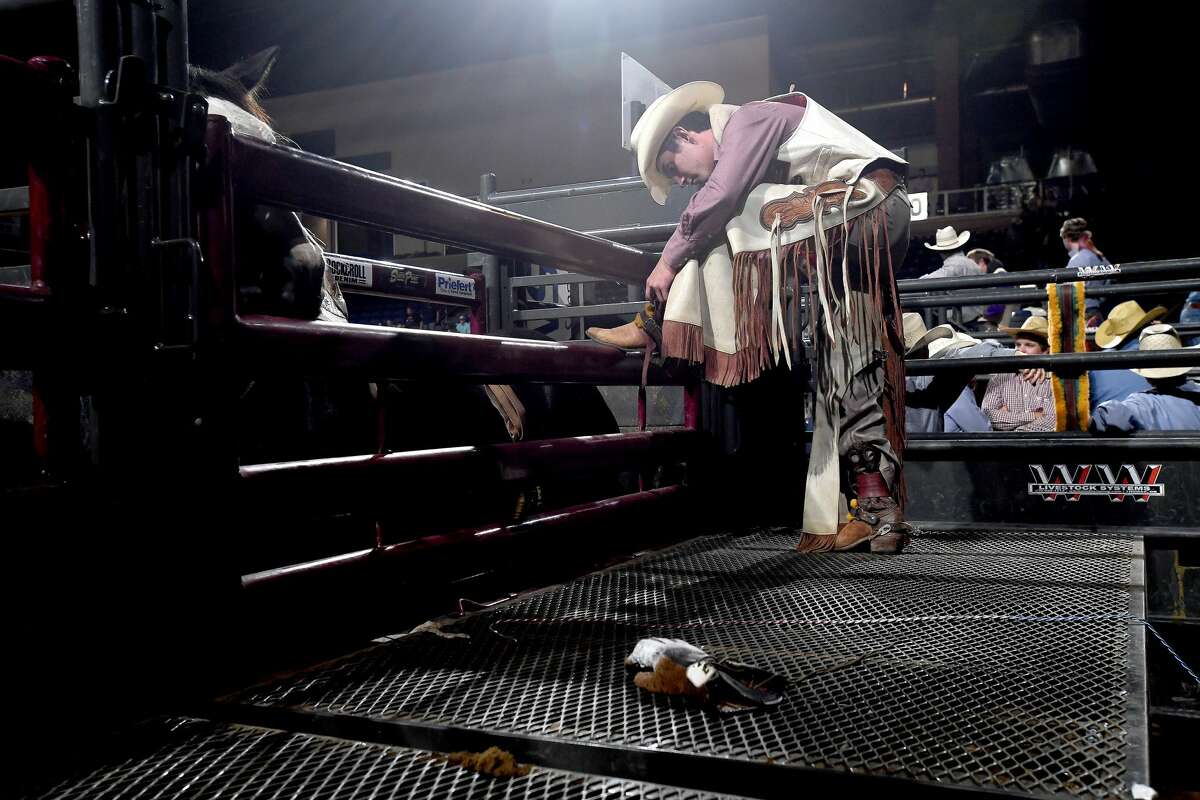 Riders get ready to compete in the 75th annual PRCA rodeo on its opening night at the YMBL South Texas State Fair Friday. Photo made Friday, May 21, 2021 Kim Brent/The Enterprise