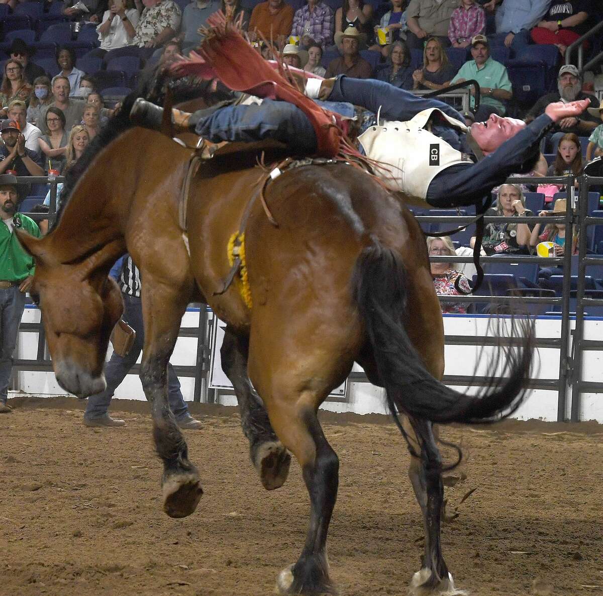 Riders compete in the 75th annual PRCA rodeo on its opening night at the YMBL South Texas State Fair Friday. Photo made Friday, May 21, 2021 Kim Brent/The Enterprise