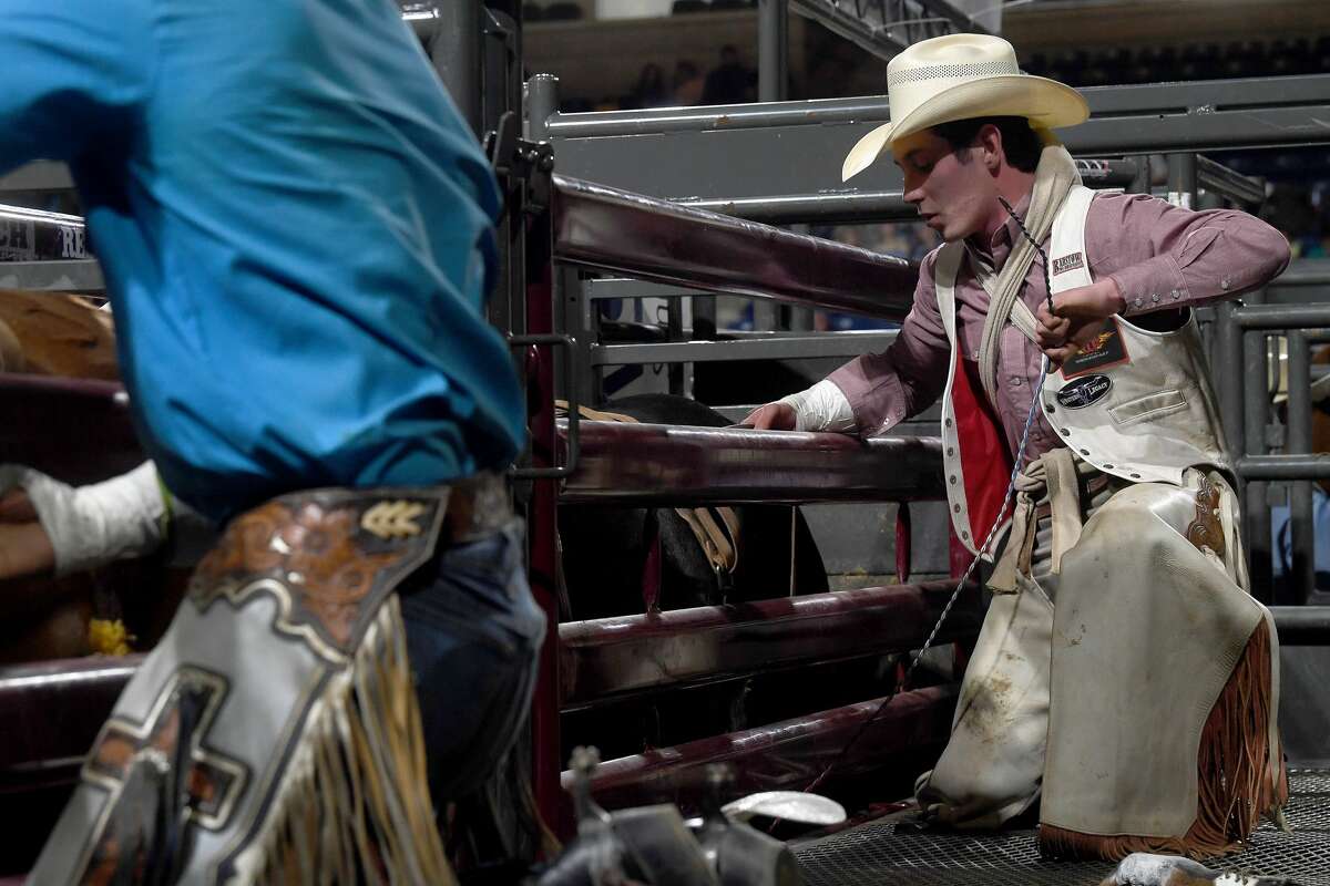 Riders compete in the 75th annual PRCA rodeo on its opening night at the YMBL South Texas State Fair Friday. Photo made Friday, May 21, 2021 Kim Brent/The Enterprise