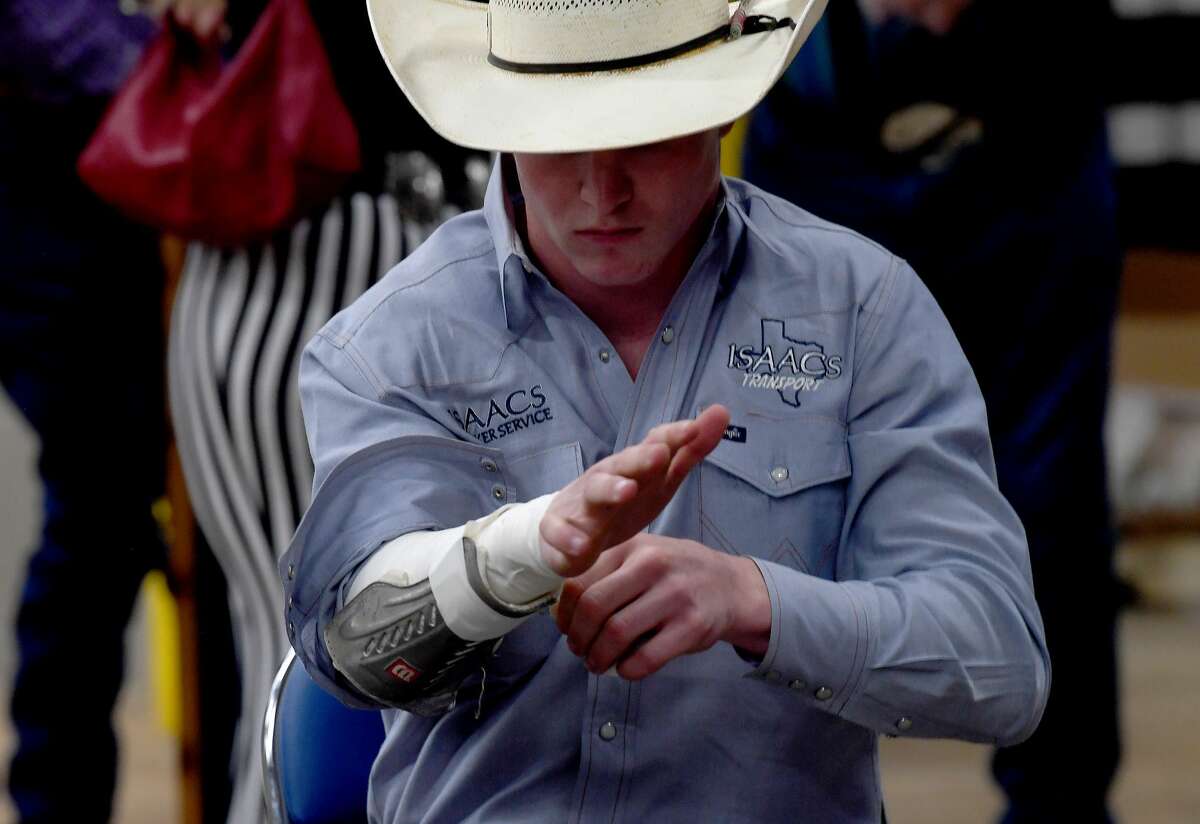 Riders get ready to compete in the 75th annual PRCA rodeo on its opening night at the YMBL South Texas State Fair Friday. Photo made Friday, May 21, 2021 Kim Brent/The Enterprise