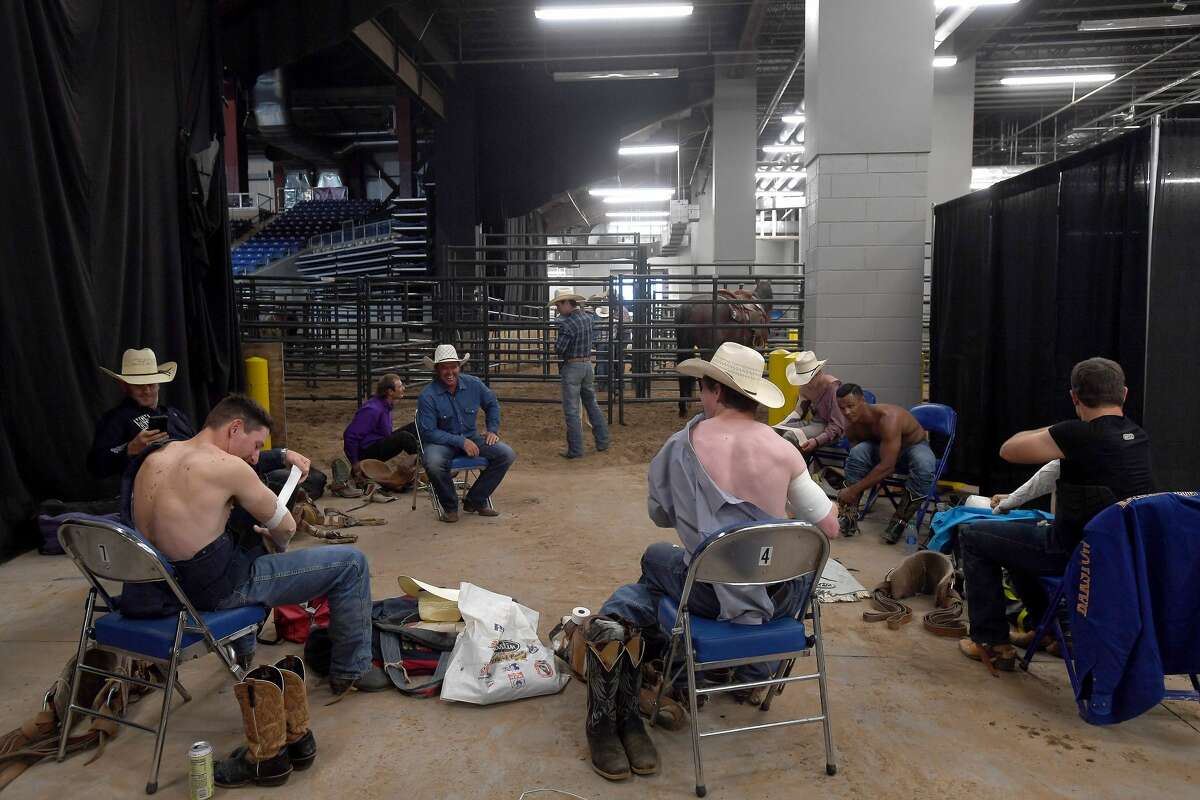 Riders get ready to compete in the 75th annual PRCA rodeo on its opening night at the YMBL South Texas State Fair Friday. Photo made Friday, May 21, 2021 Kim Brent/The Enterprise