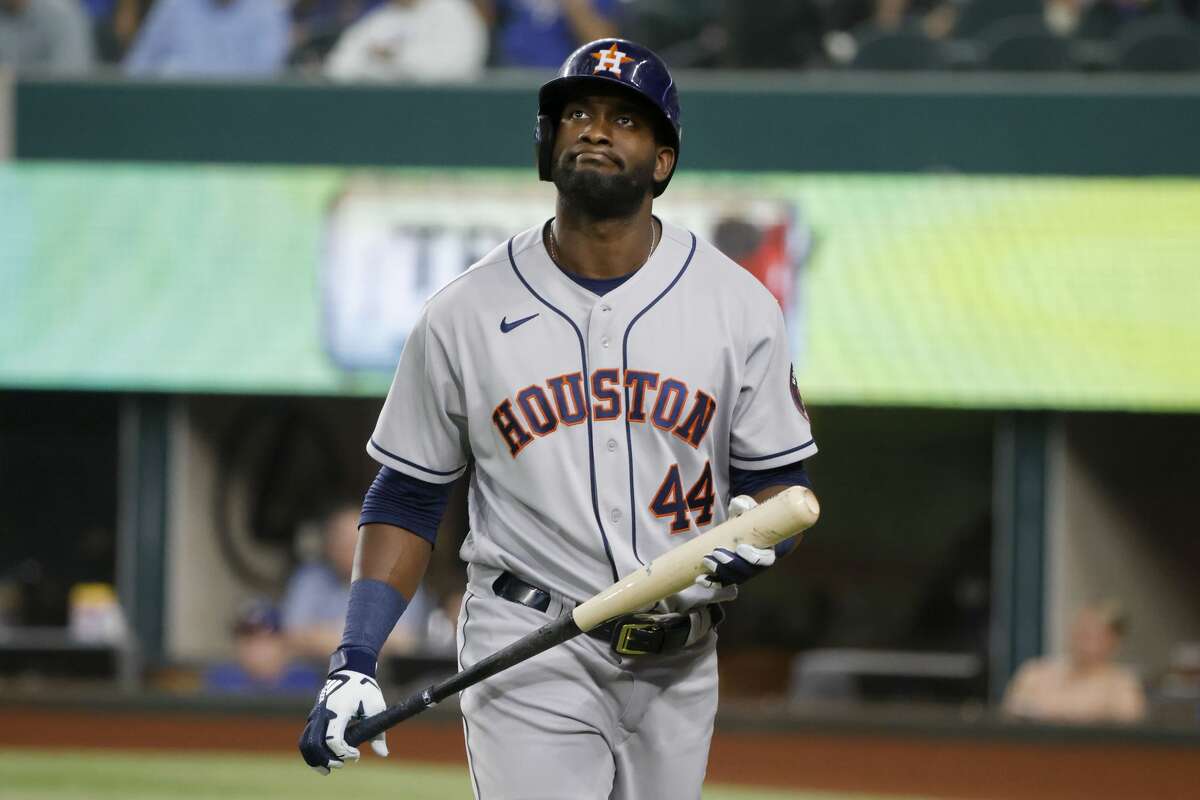 Houston Astros designated hitter Yordan Alvarez reacts after striking out against the Texas Rangers during the fourth inning of a baseball game Saturday, May 22, 2021, in Arlington, Texas. (AP Photo/Michael Ainsworth)