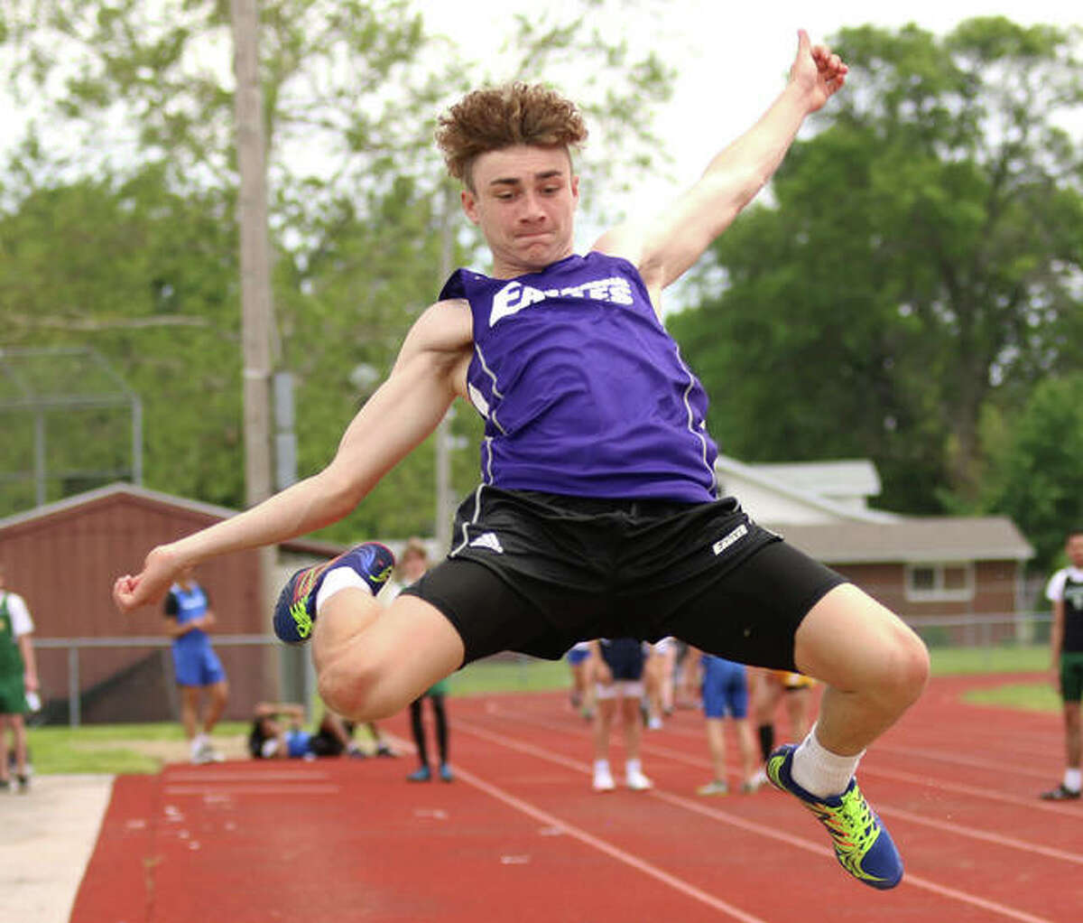 CM sophomore Bryce Davis competes in the long jump during the Madison County Small-Schools boys track meet last Monday at Wood River. Davis won the event.