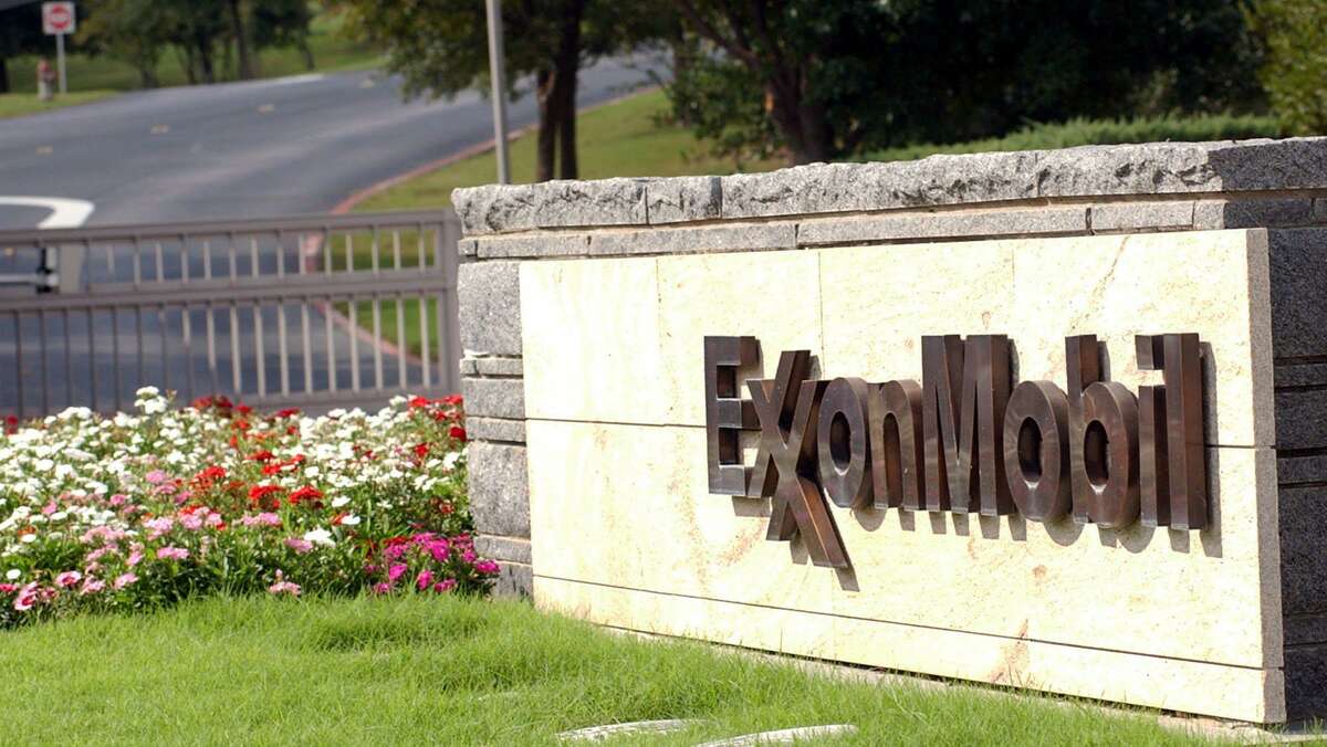 ** FILE ** A sign marks the entrance of the secluded Exxon Mobil cooperate headquarters in Irving, Texas, Thursday, Oct. 30, 2003. Exxon Mobil is in the second position on the Fortune 100 list of top U.S. companies. (AP Photo/LM Otero)