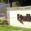 ** FILE ** A sign marks the entrance of the secluded Exxon Mobil cooperate headquarters in Irving, Texas, Thursday, Oct. 30, 2003. Exxon Mobil is in the second position on the Fortune 100 list of top U.S. companies. (AP Photo/LM Otero)