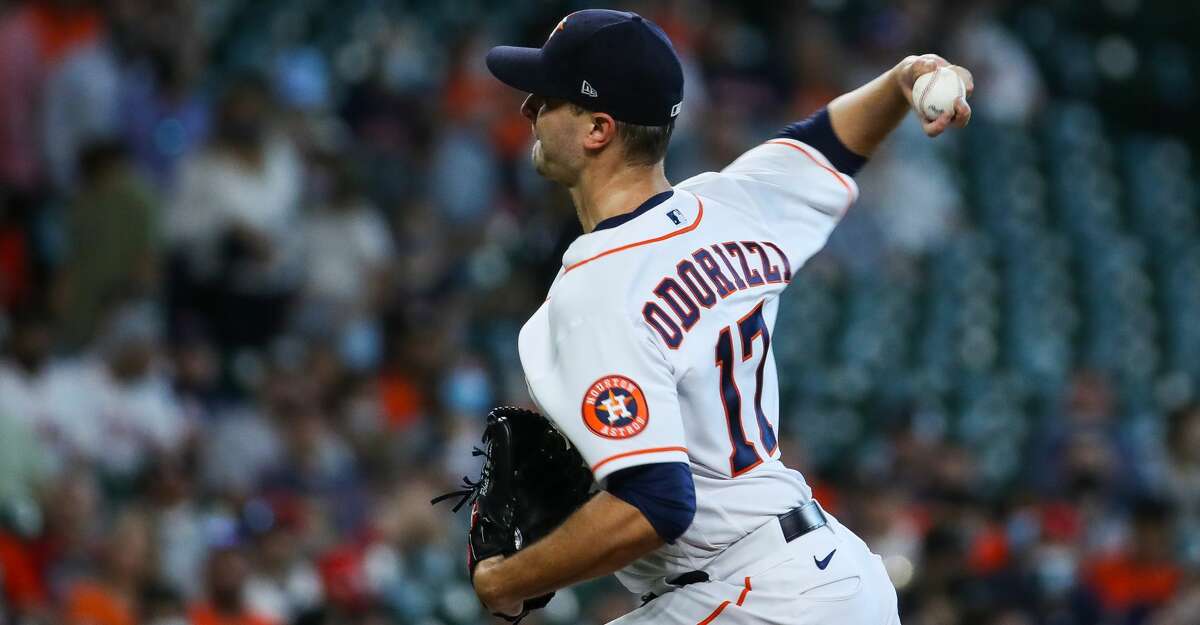 Houston Astros starting pitcher Jake Odorizzi (17) throws against the Los Angeles Angels during the first inning of an MLB game at Minute Maid Park on Saturday, April 24, 2021, in Houston.