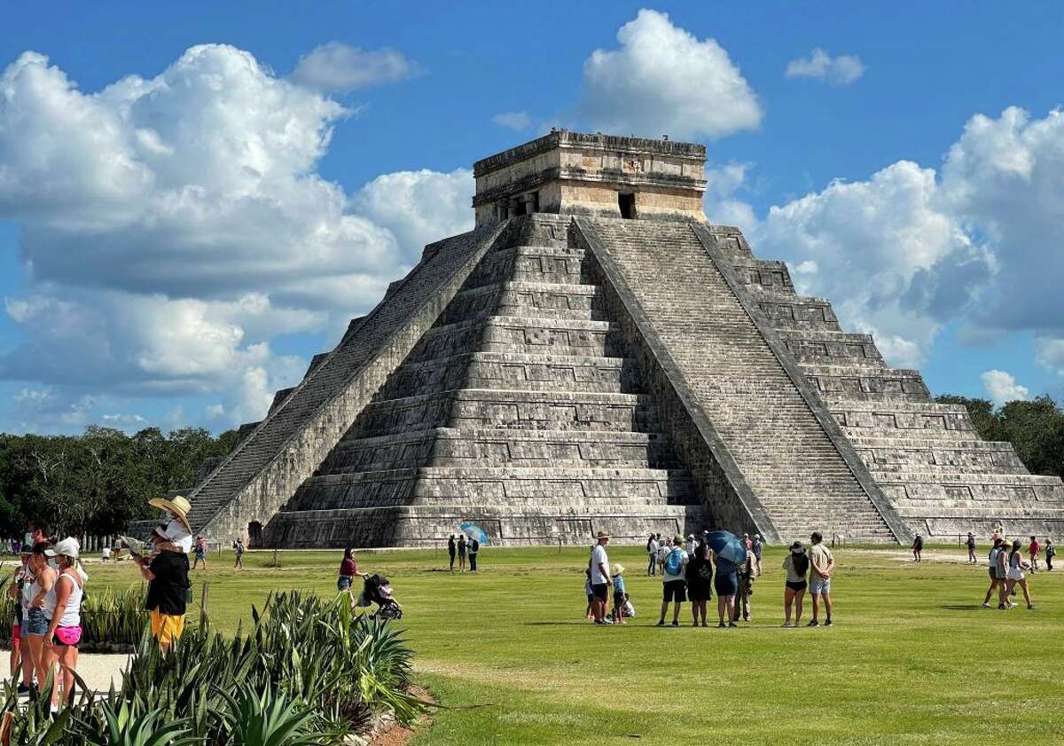 Tourists wearing face masks are seen at Chichen Itza archaeological site in Mexico on March 5, 2021.