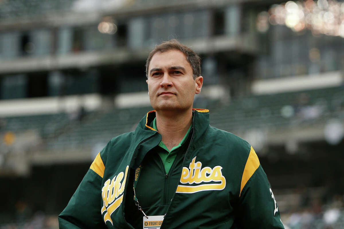 Dave Kaval, president of the Oakland Athletics, walks on the field before the game against the Seattle Mariners at Ring Central Coliseum on June 15, 2019.
