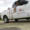 Using a custom built spraying trucks, Adam Johnson with Jefferson County Mosquito Control sprayed chemicals into street curbs and gutter drains in the spring . Dave Ryan/The Enterprise