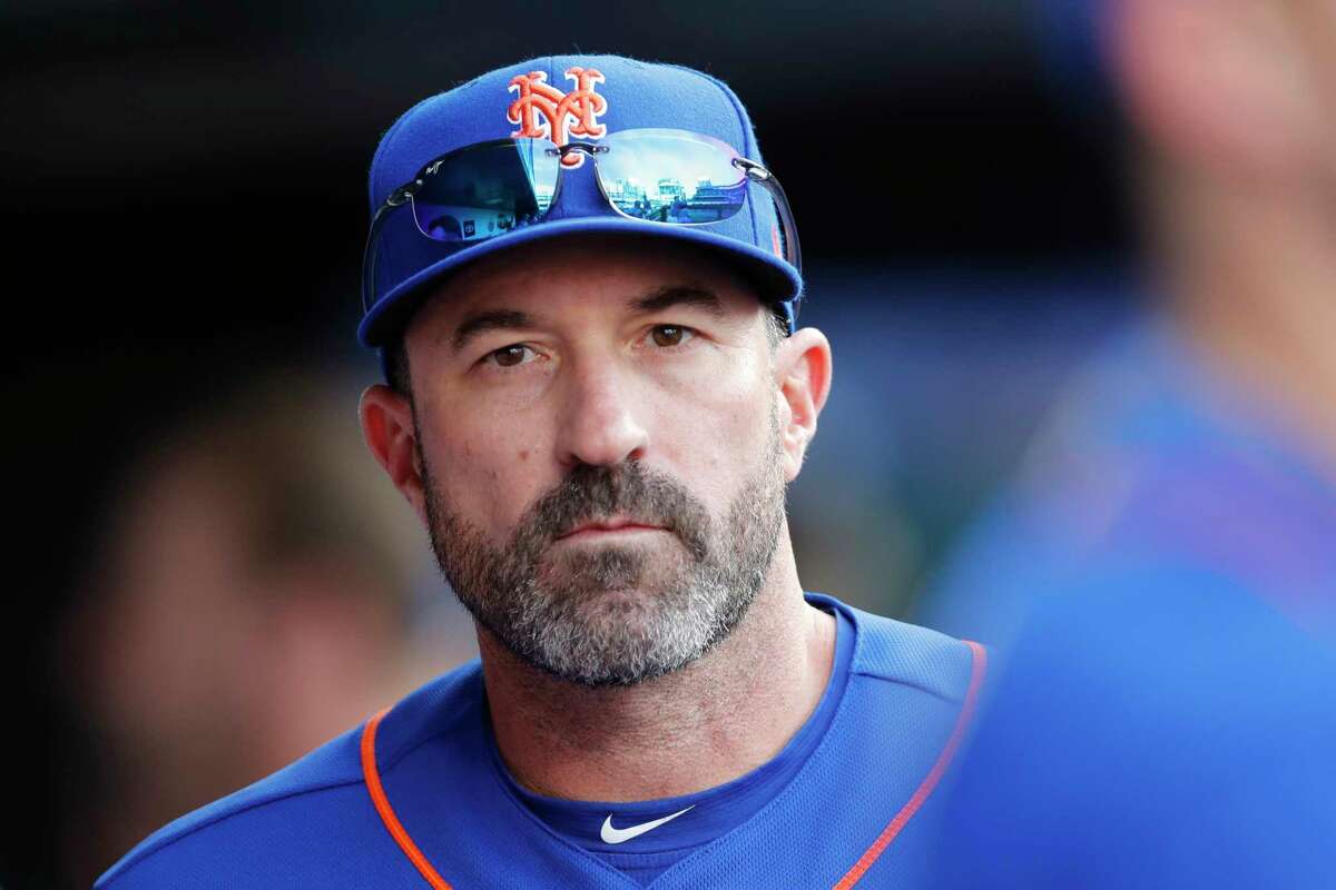 New York Mets manager Mickey Callaway looks out from the dugout during a baseball game against the Atlanta Braves, Sunday, Sept. 29, 2019, in New York. (AP Photo/Kathy Willens)