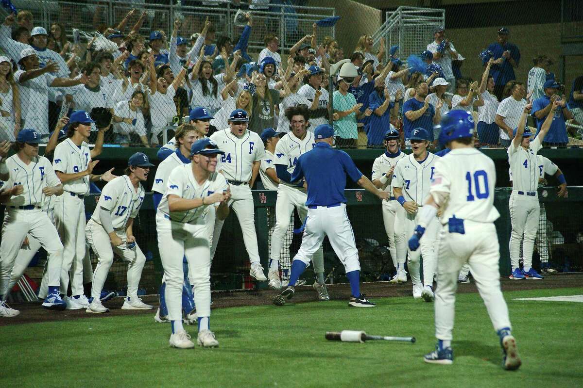 Friendswood celebrates a run scored against College Station Wednesday, May 26 at the University of Houston.