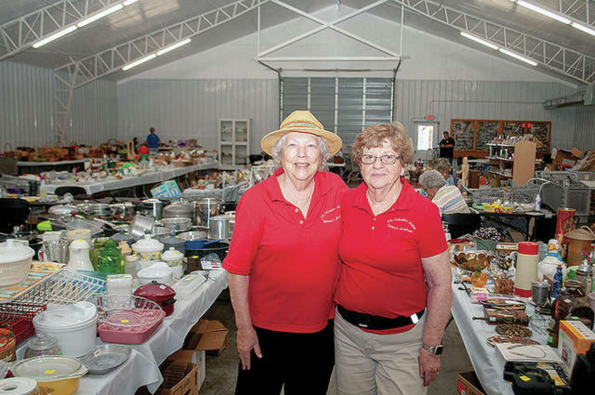 Co-chairs Gloria Biggs (left) and Carol Piper of The Salvation Army Women’s Auxiliary stand among items donated for their spring sale. Both now are gearing up for the H.O.P.S sale, which will be Sept. 30 and Oct. 1. Donations can be dropped off Monday through Wednesday at the Morgan County Fairground's 4-H building. 