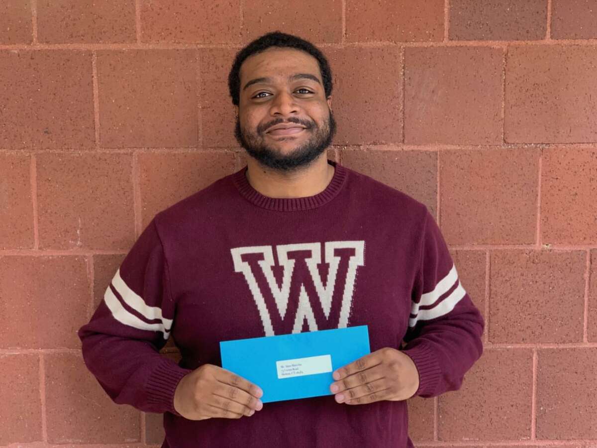 Alain Marcelin, who will receive his bachelor’s degree in business administration from Post University, was recently awarded a Boys and Girls Club of Lower Naugatuck Valley scholarship.