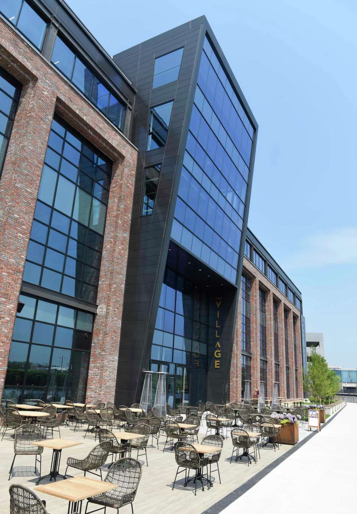 The Village commercial office space in Stamford is an environment featuring anchor tenants Wheelhouse Entertainment, ITV America, and Cisco Brewers.