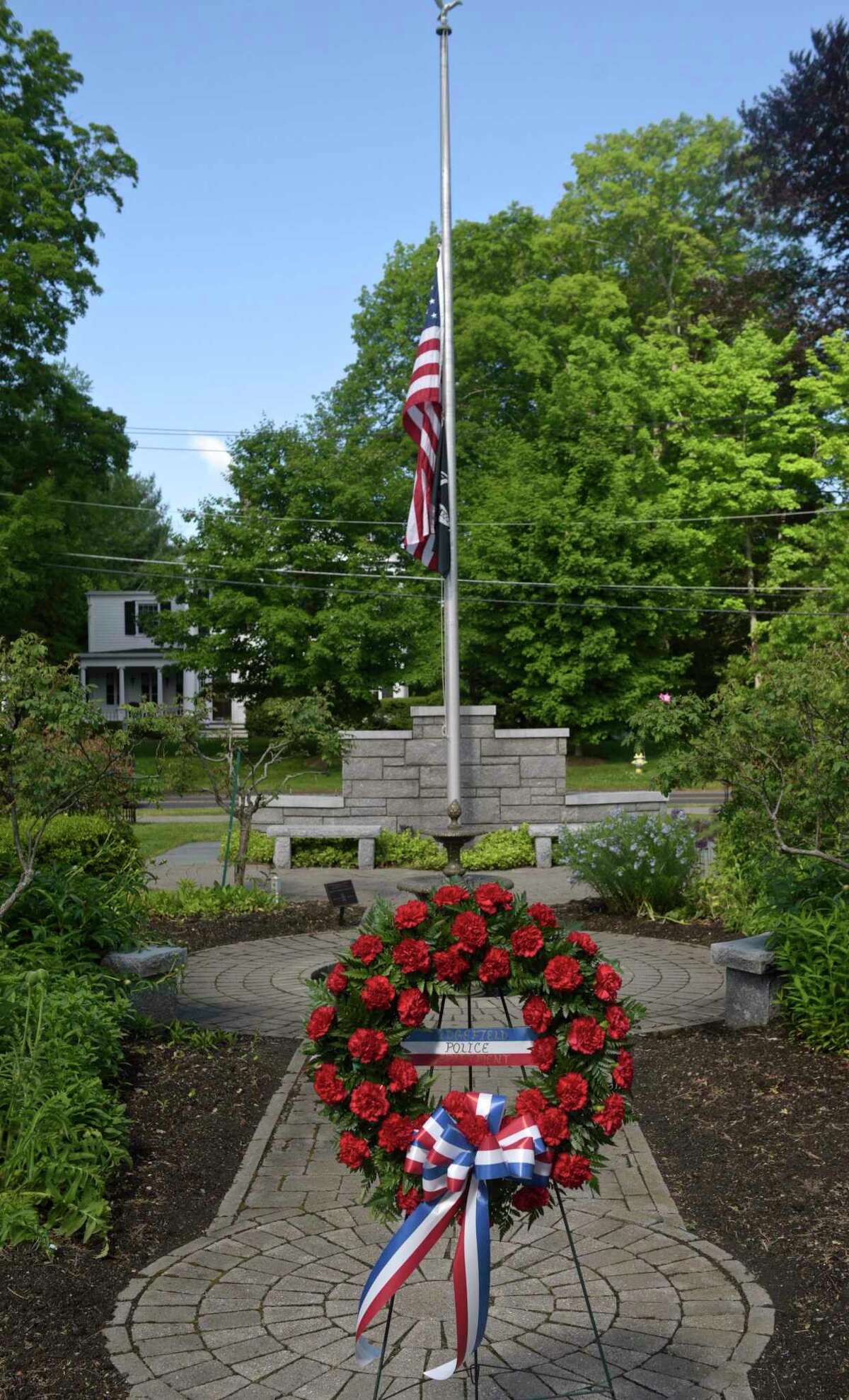 The Ridgefield Police Department held their annual Memorial Ceremony to honor and pay tribute to deceased members of the department. At the Lounsbury House, in Ridgefield, Conn, Thursday, May 27, 2021.