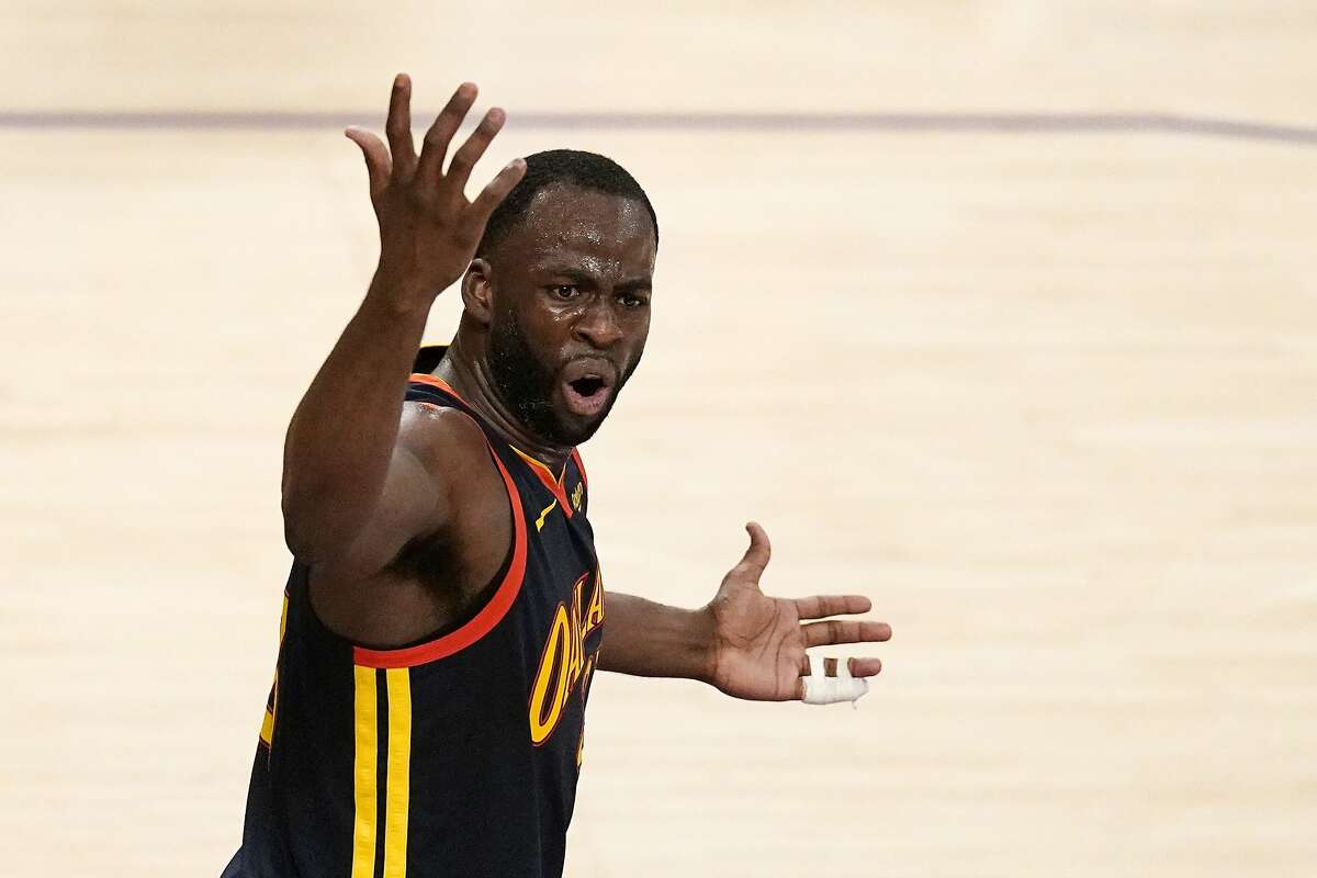 Golden State Warriors forward Draymond Green complains about a call to a referee during an NBA basketball Western Conference Play-In game against the Los Angeles Lakers Wednesday, May 19, 2021, in Los Angeles. The Lakers won 103-100. (AP Photo/Mark J. Terrill)
