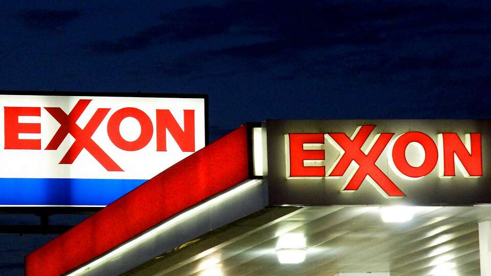 (FILES) An Exxon sign is seen at a station in this September 20, 2008 file photo in Manassas, Virginia. - ExxonMobil's chief executive defended the company at its annual meeting on May 26, 2021 as the oil giant sought to fend off a major activist challenge over its policies to address climate change. ExxonMobil faces a number of climate-related votes at the gathering, which went into a one-hour recess late Wednesday morning following speeches from sponsors of the shareholder motions. (Photo by KAREN BLEIER / AFP FILES / AFP) (Photo by KAREN BLEIER/AFP FILES/AFP via Getty Images)