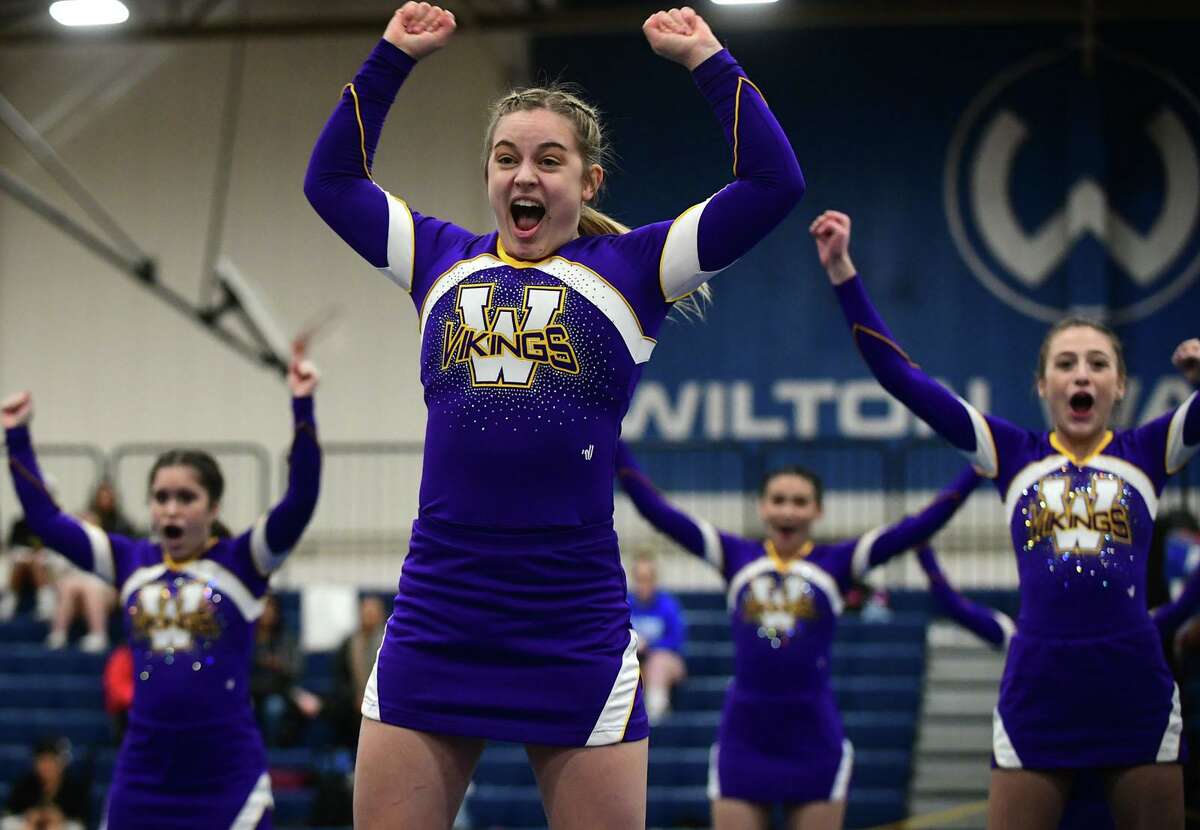 1The Westhill High School cheerleading squad competes during the FCIAC cheerleading championships at Wilton High School in Wilton, Conn.