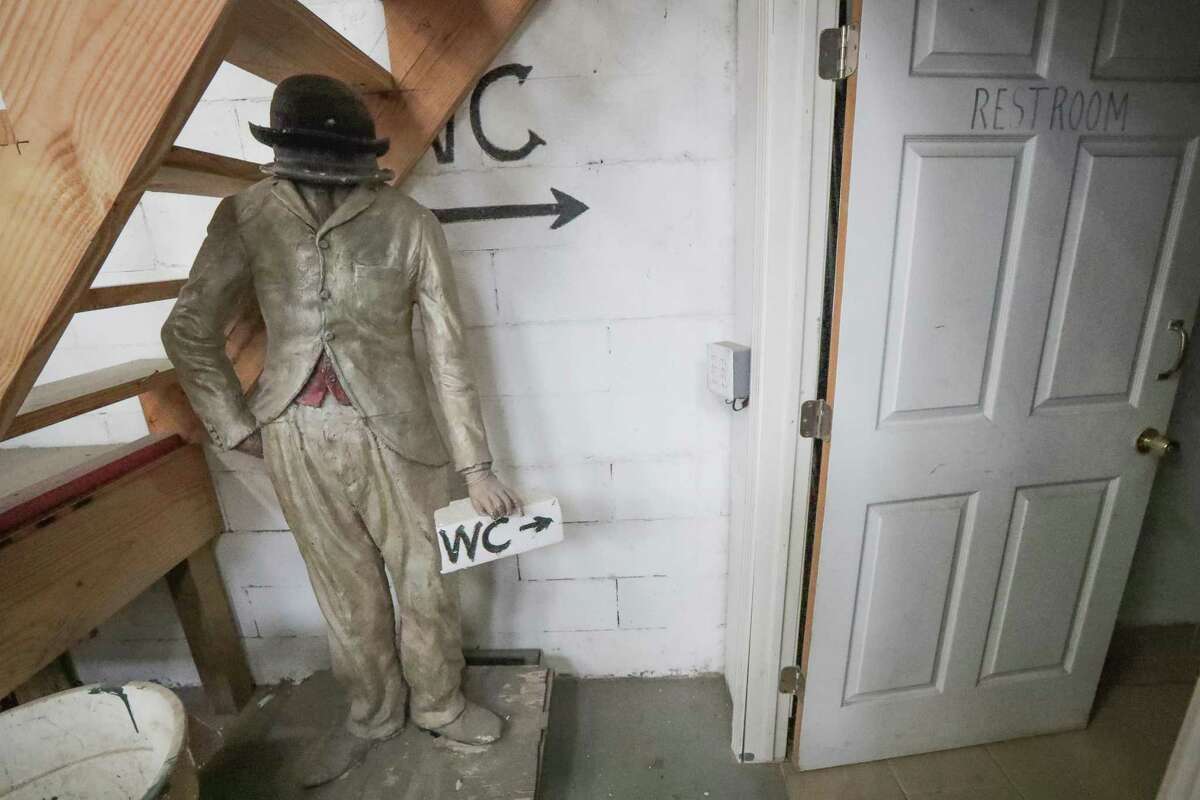 Almost every space inside David Adickes warehouse has some of his artwork, even giving directions to the restroom Tuesday, May 18, 2021, in Houston.