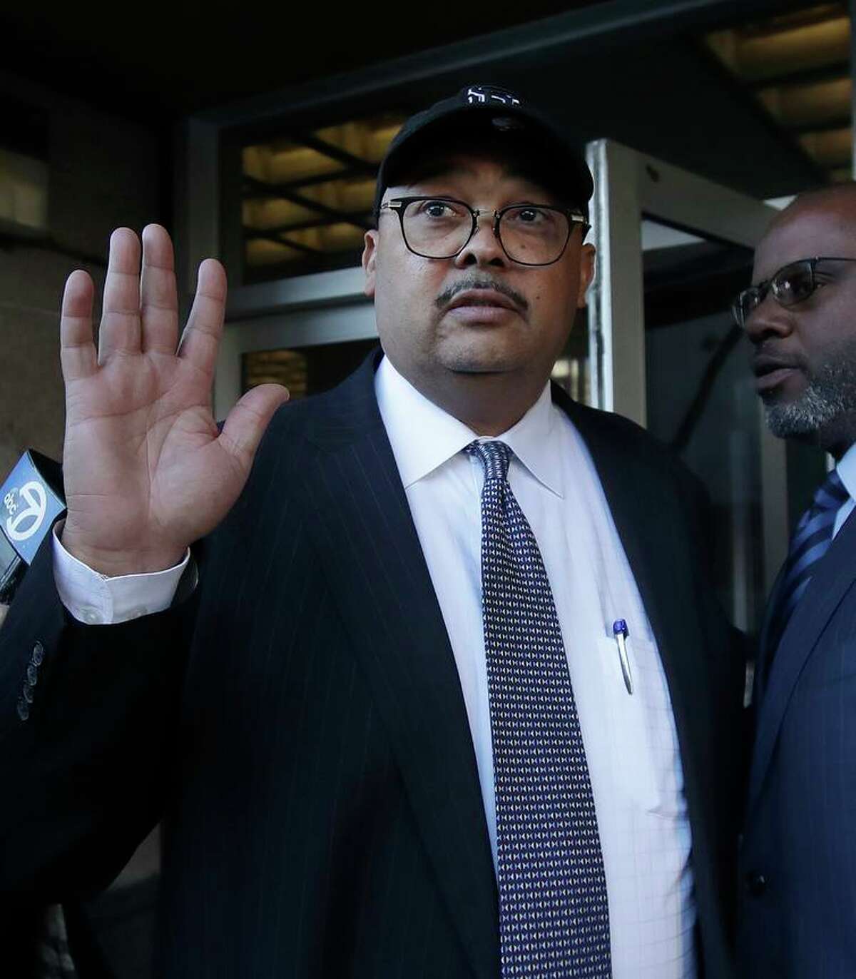 Former Public Works Director Mohammed Nuru (center), who pleaded guilty to accepting bribes from contractors. leaves federal courthouse in San Francisco with attorney Ismail Ramsey in 2020.