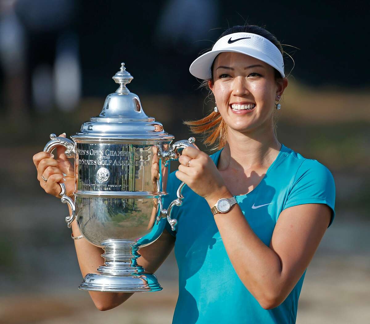 Michelle Wei는 Pinehurst에서 열린 2014 US 오픈에서 우승 한 최초의 아시아계 미국인 골퍼가되었습니다.