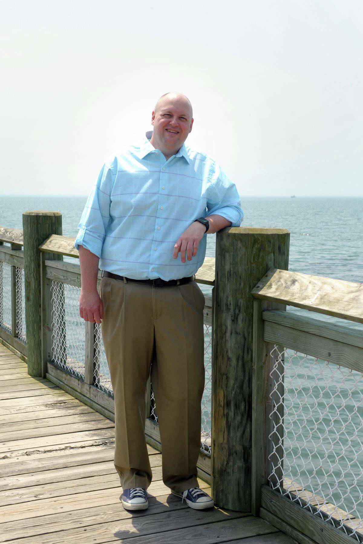 Stan Osoweicki on the pier at Walnut Beach, near his home in Milford, Conn. May 26, 2021.