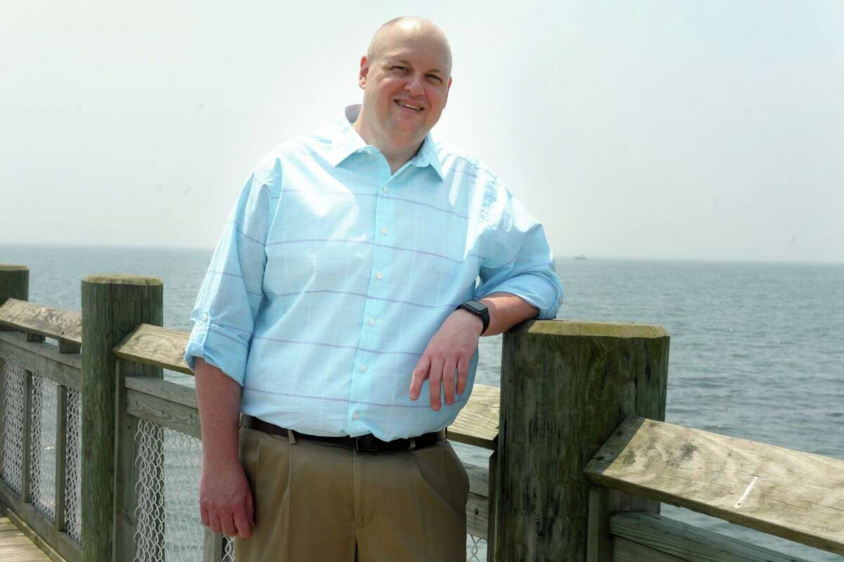 Stan Osoweicki on the pier at Walnut Beach, near his home in Milford, Conn. May 26, 2021.