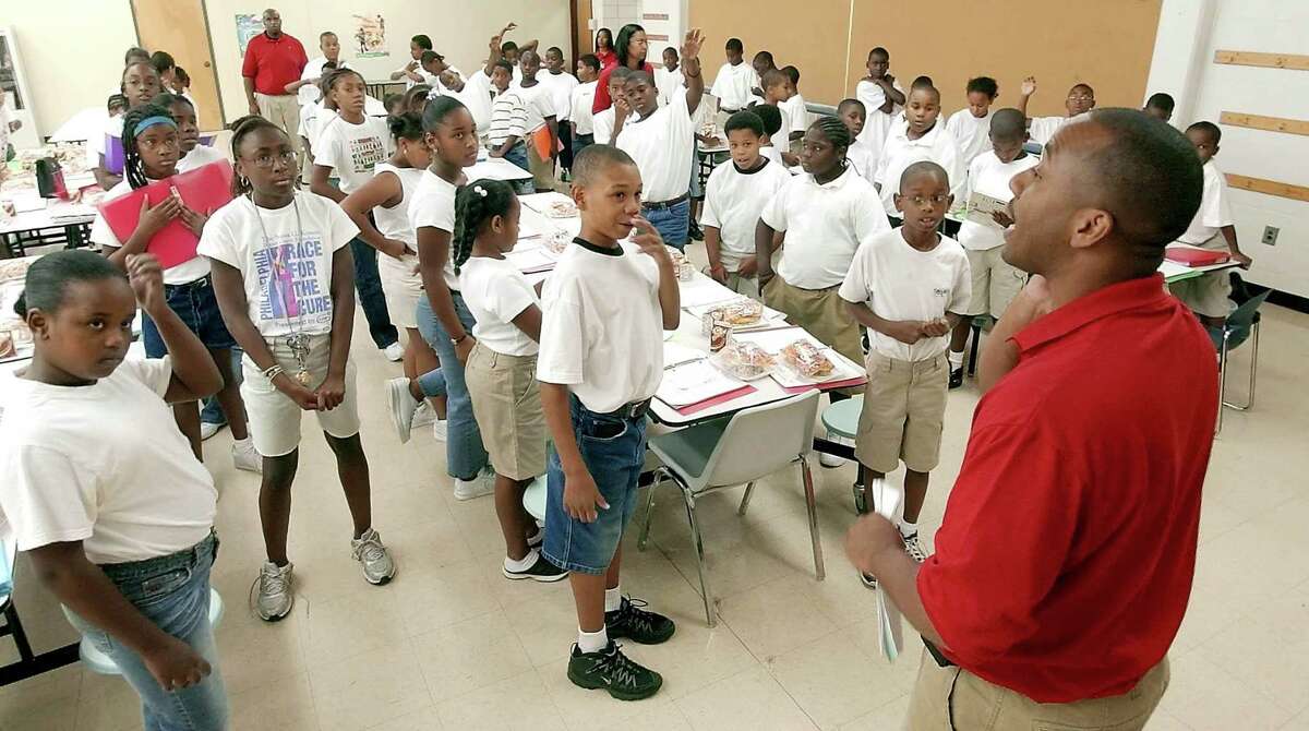 KIPP Tulsa College Preparatory Principal Millard House II, pictured in 2005, speaks to the inaugural class of fifth-graders at the new school during a special summer session. House, who is Houston ISD’s lone superintendent finalist, has worked in three school districts across the south with at least 35,000 students.