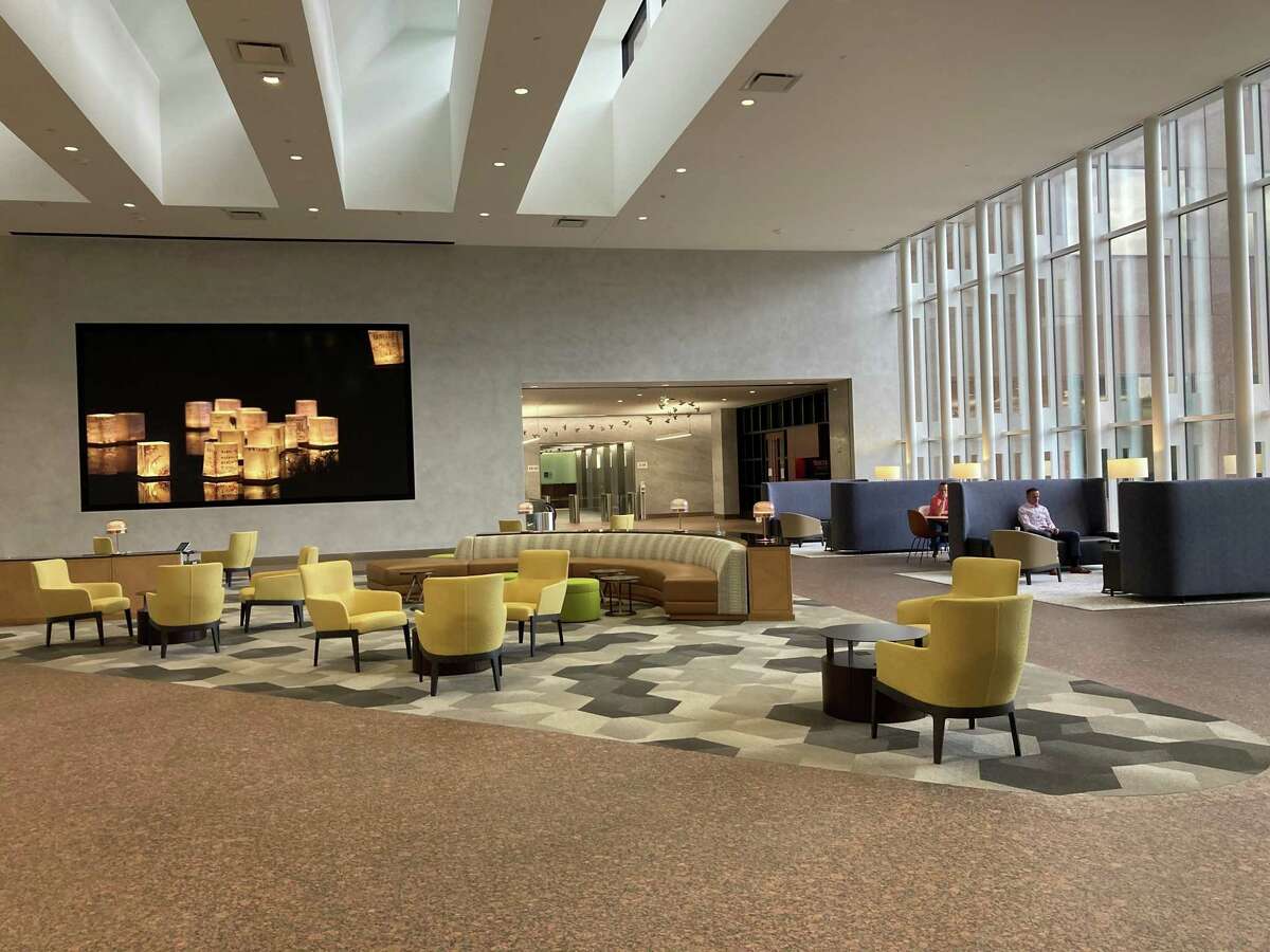 The redesigned lobby lounge at Marathon Oil Tower includes a coffee bar, new collaborative seating areas, a large media wall, Wi-Fi and art pieces from Margo Wolowiec and Michael Pendry. The building, at 5555 San Felipe, is owned by M-M Properties. CBRE handles leasing.