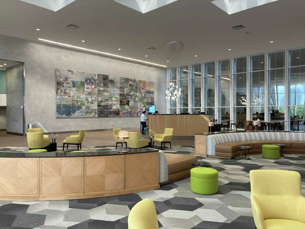 The redesigned lobby lounge at Marathon Oil Tower includes a coffee bar, new collaborative seating areas, a large media wall, Wi-Fi and art pieces from Margo Wolowiec and Michael Pendry. The building, at 5555 San Felipe, s owned by M-M Properties. CBRE handles leasing.